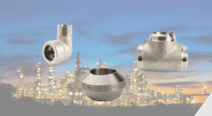 stainless steel fittings and an image of a refinery